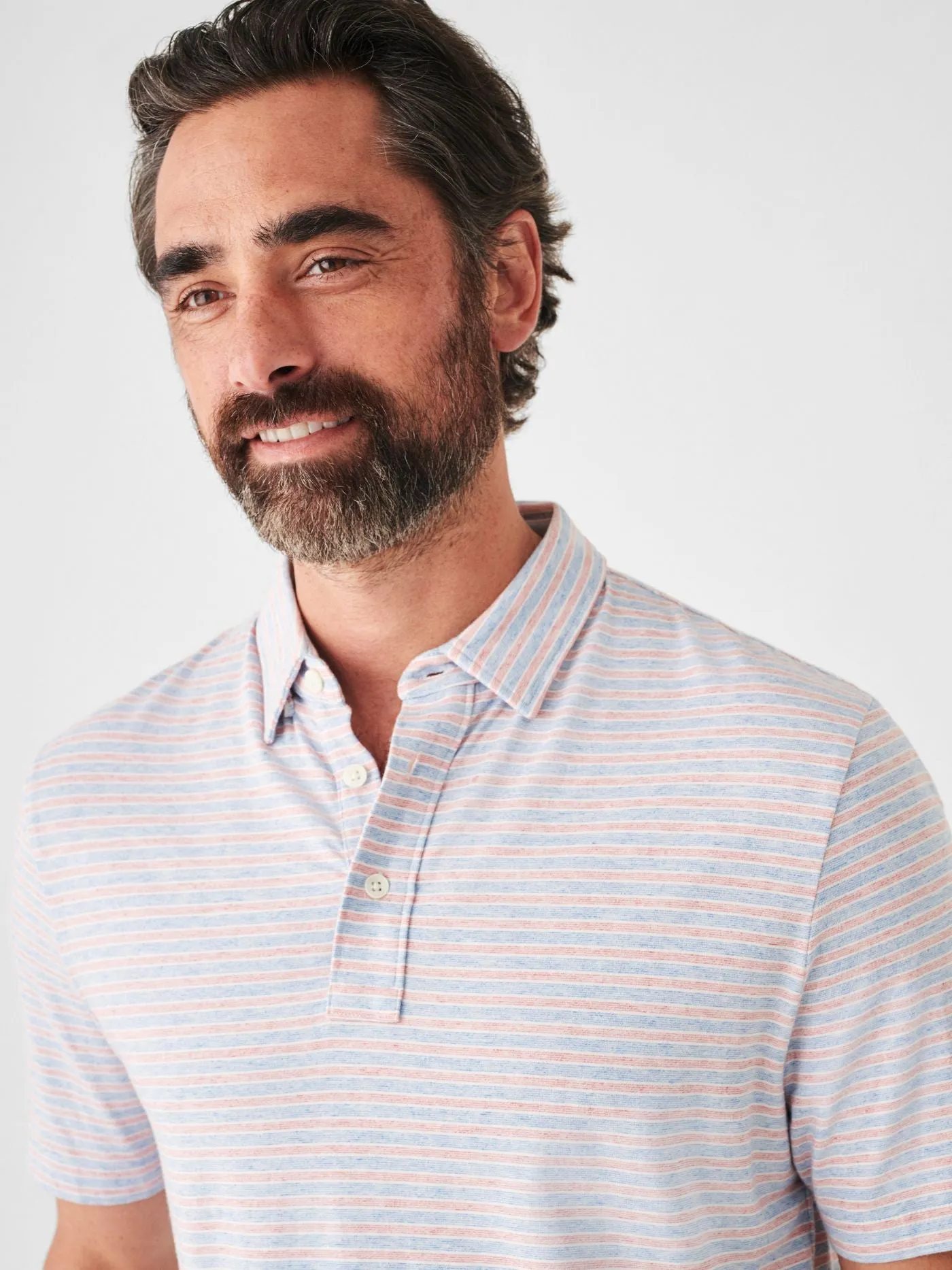 Faherty Short Sleeve Movement Polo in Horizon Line Stripe