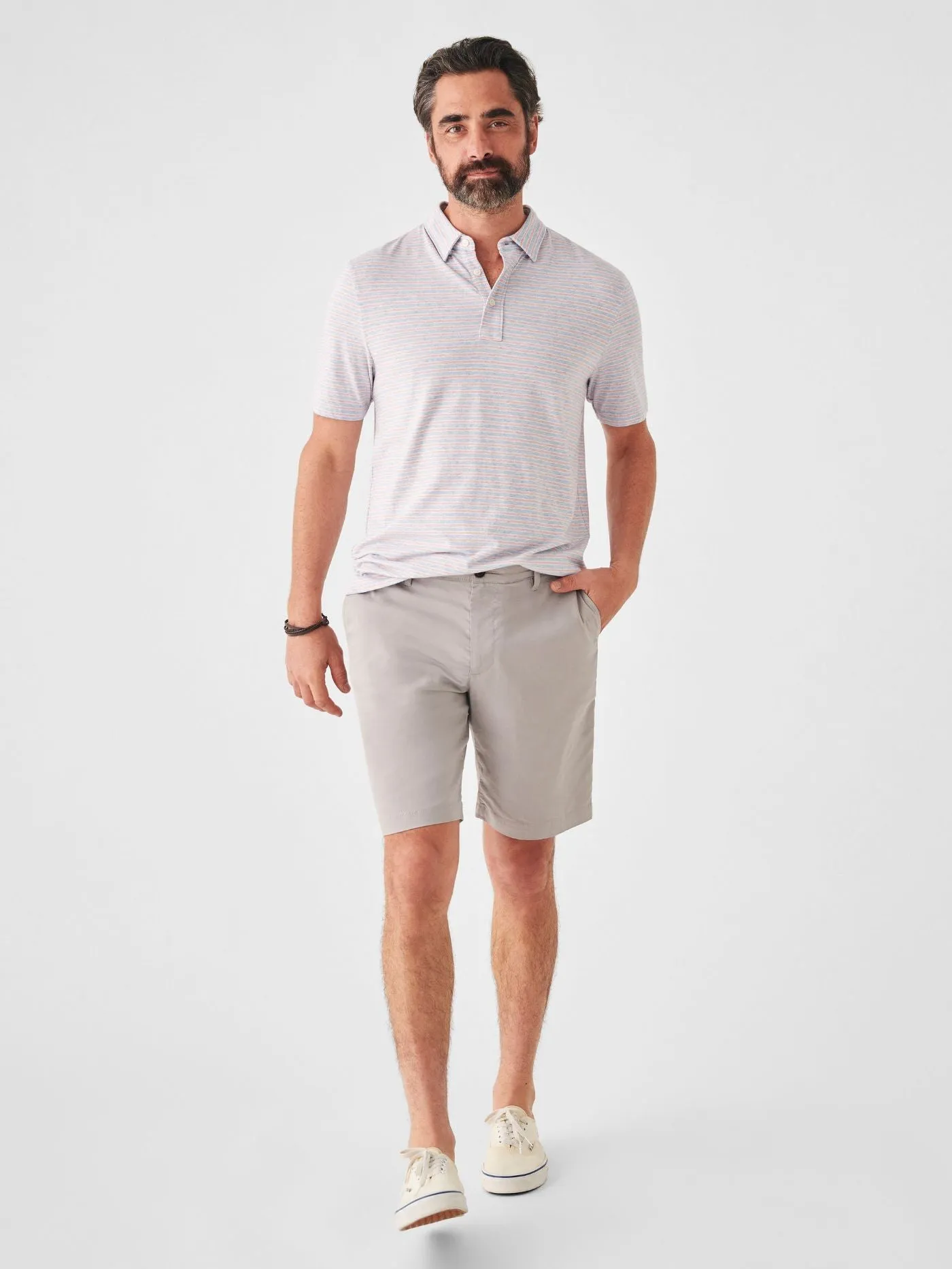 Faherty Short Sleeve Movement Polo in Horizon Line Stripe