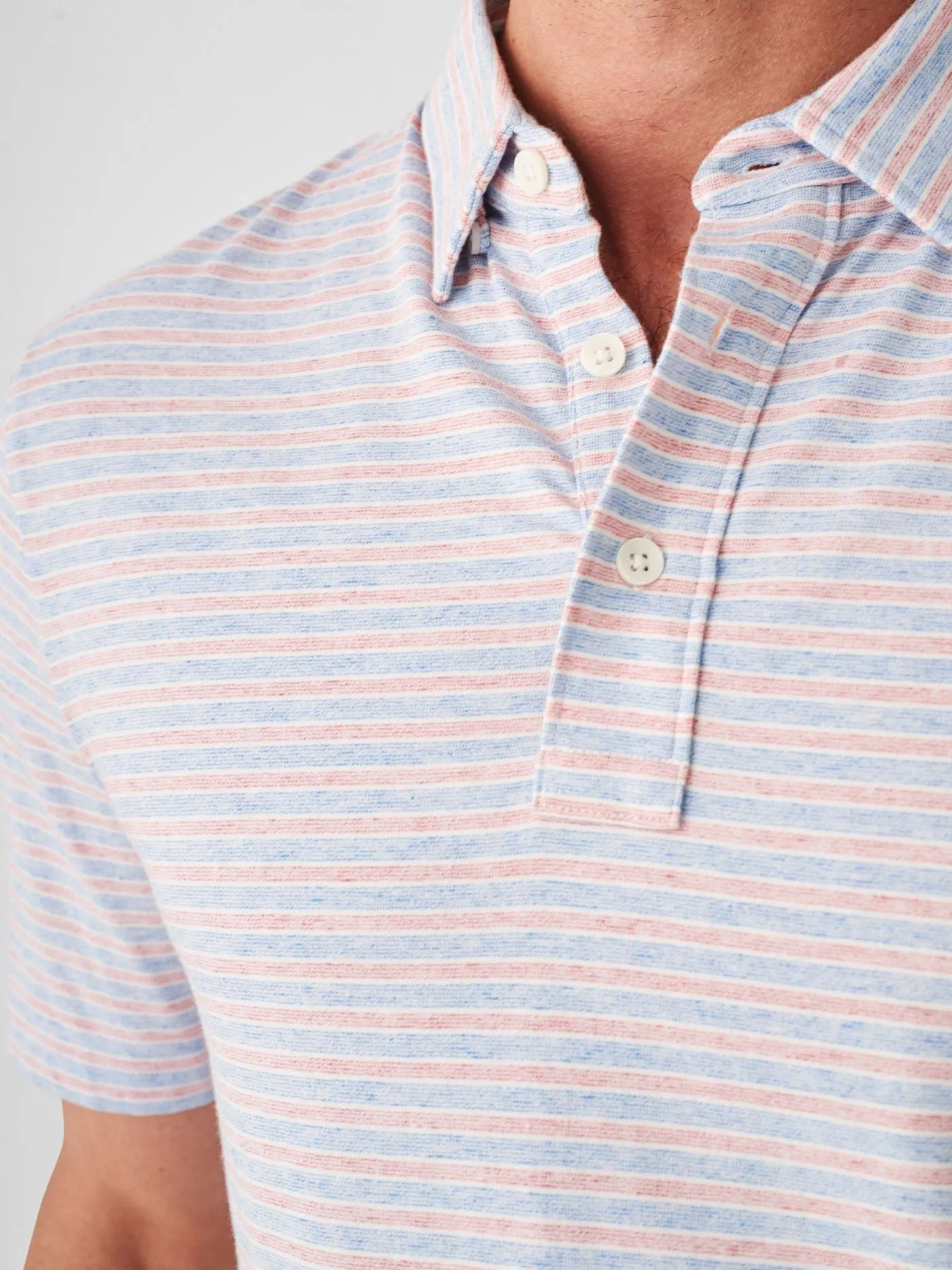 Faherty Short Sleeve Movement Polo in Horizon Line Stripe